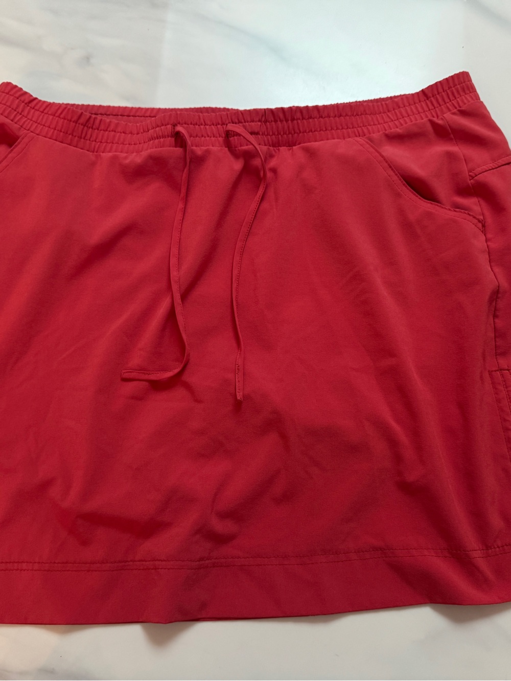 Lee coral flowy tennis shirt/skort with built in shorts pockets